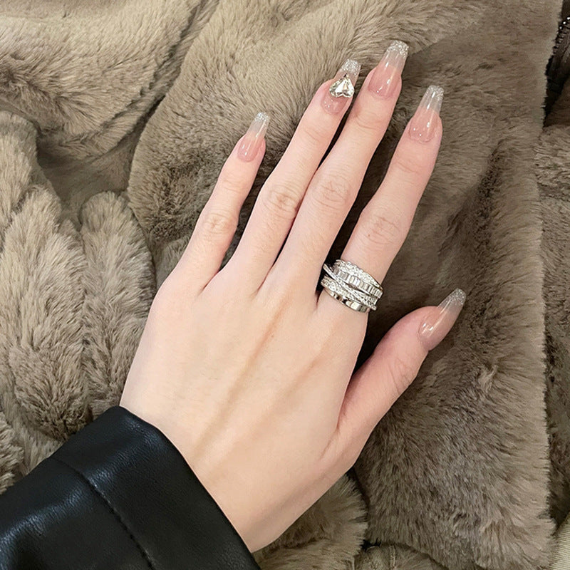 Retro cross-shaped hollowed-out ring with adjustable size adjustment function